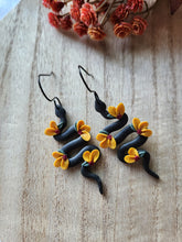 Load image into Gallery viewer, Black Sunflower Snake Dangles
