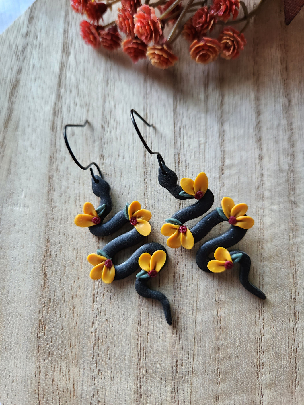 Black Sunflower Snake Dangles