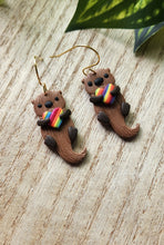 Load image into Gallery viewer, PRIDE Rainbow Heart Otter Dangles
