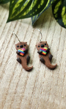 Load image into Gallery viewer, PRIDE Rainbow Heart Otter Dangles
