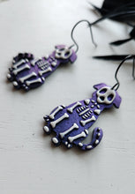 Load image into Gallery viewer, Colorshift Skelly Dog Dangle Earrings
