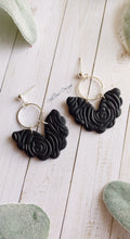 Load image into Gallery viewer, Black Embossed Angel Wings Clay Earrings
